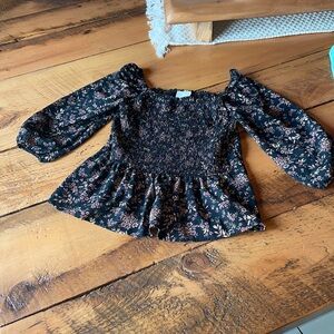 Euc large peplum floral evenly top